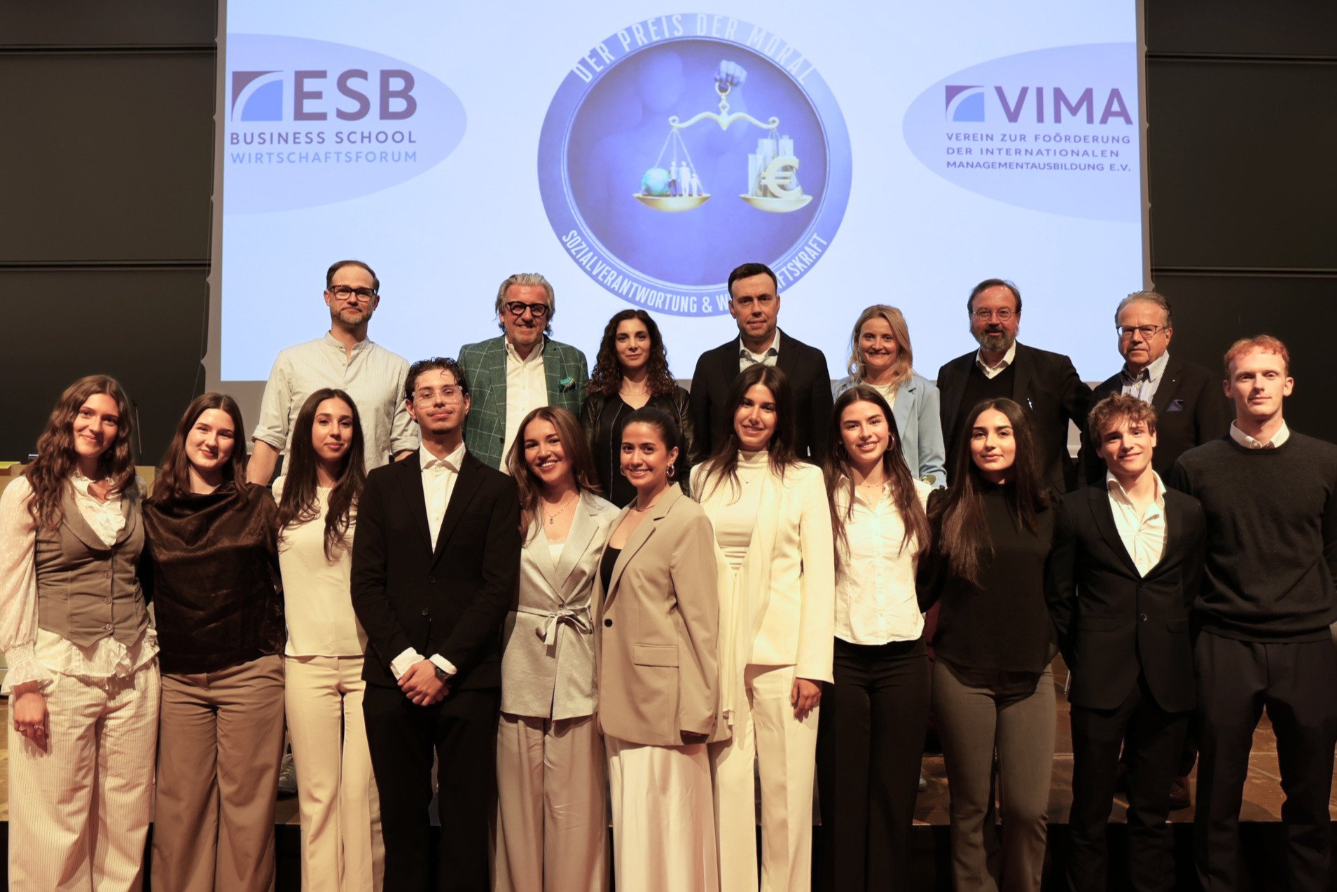speakers with the student team that organised the ESB Economic Forum 2026