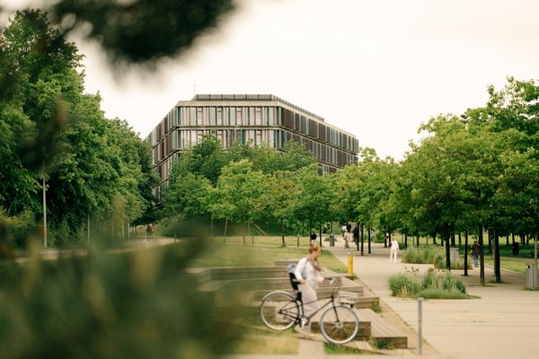 building of CBS campus surrounded by green trees